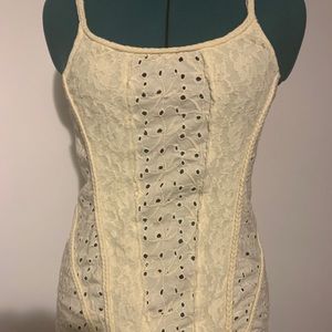 Free People. Eyelet & jersey knit tank top with spaghetti straps.